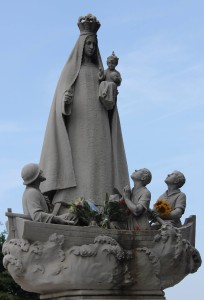 Statue of Our Lady of the Caridad del Cobre. Note the sunflower at her feet; an offering specific to Oshún. Photo: Gisela Roeder